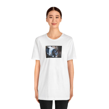 "Camera in an Athens Flea Market" Unisex Jersey Short Sleeve Tee