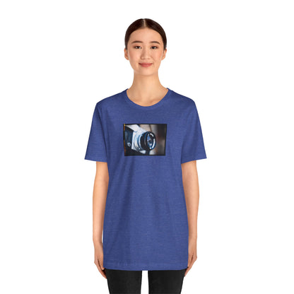 "Camera in an Athens Flea Market" Unisex Jersey Short Sleeve Tee