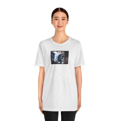 "Camera in an Athens Flea Market" Unisex Jersey Short Sleeve Tee